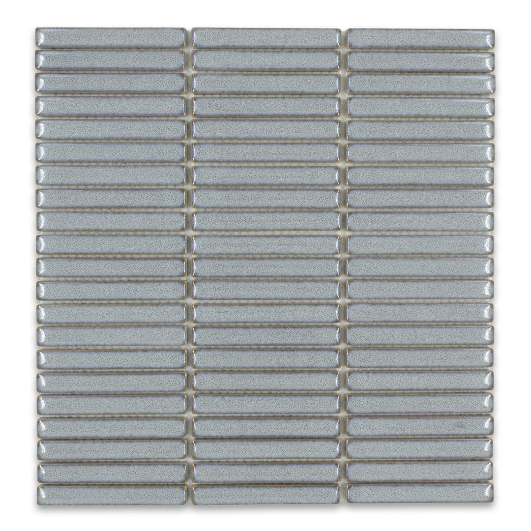 Ariel view of a single sheet of mini kitkat stacked mosaic tiles in blue glossy. The sizing is 3/8' x 3-5/8