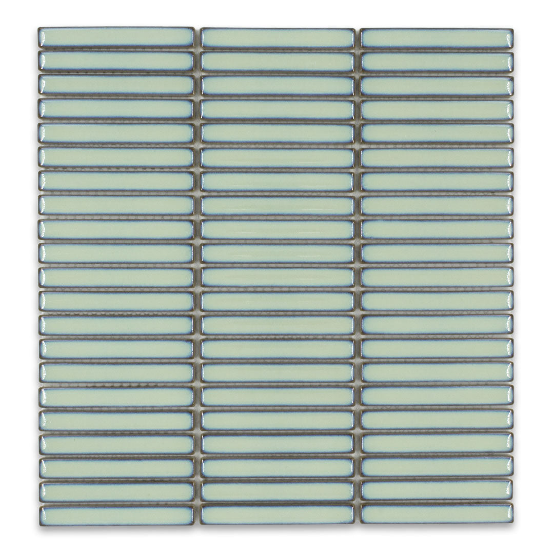 Ariel view of a single sheet of mini kitkat stacked mosaic tiles in green glossy. The sizing is 3/8' x 3-5/8