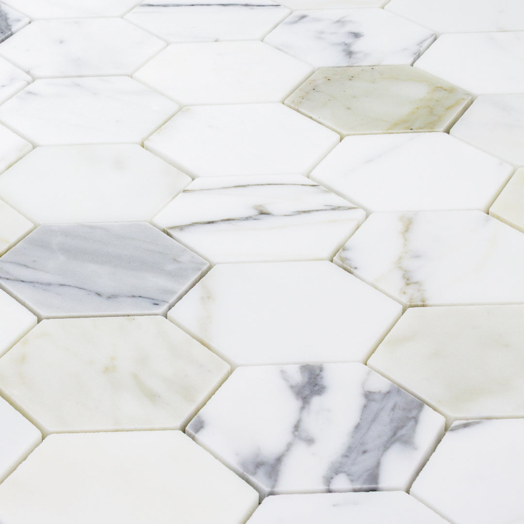 a close up of a sheet of matte calacatta 3
