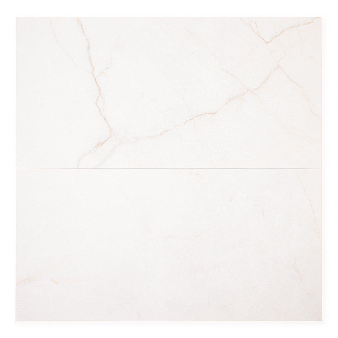 Ariel view of two side by side 12x24 sanctuary bianco marble look white tiles with fine grey veining showing the barely there pattern. 