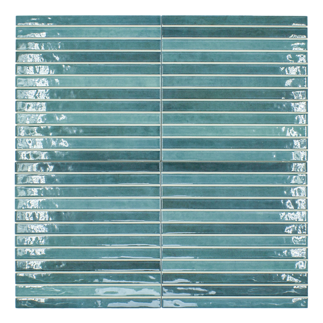 a navy blue glossy fluted kitkat tile with colour variation 