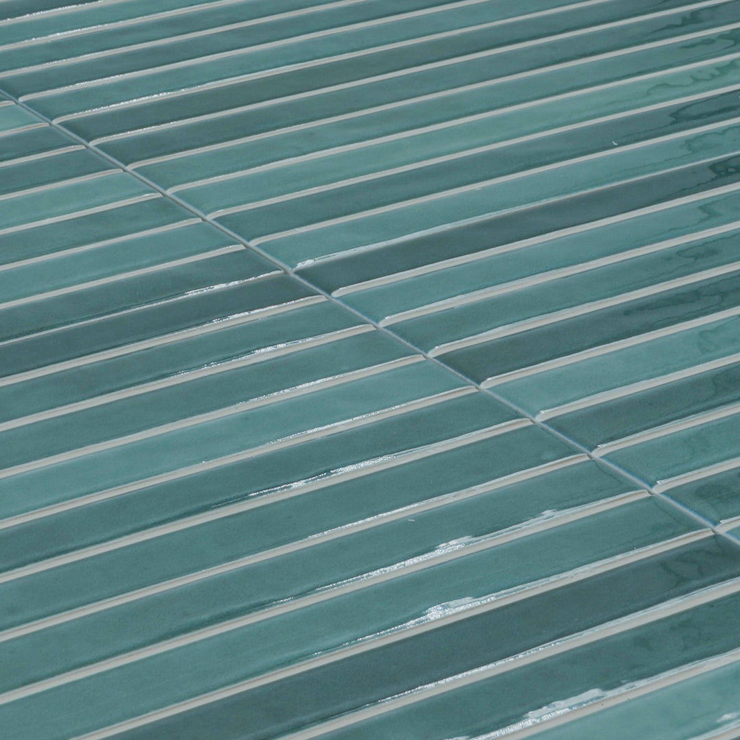 angled close up of tempo navy fluted glossy navy tiles with skinny kitkat appearance 