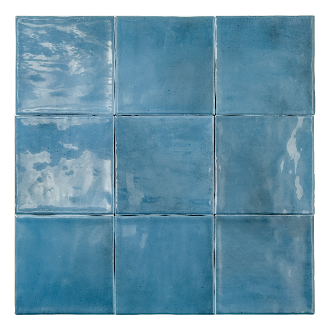 Ariel view of nine glossy 4x4 textured sapphire blue tiles showing the colour and texture. 