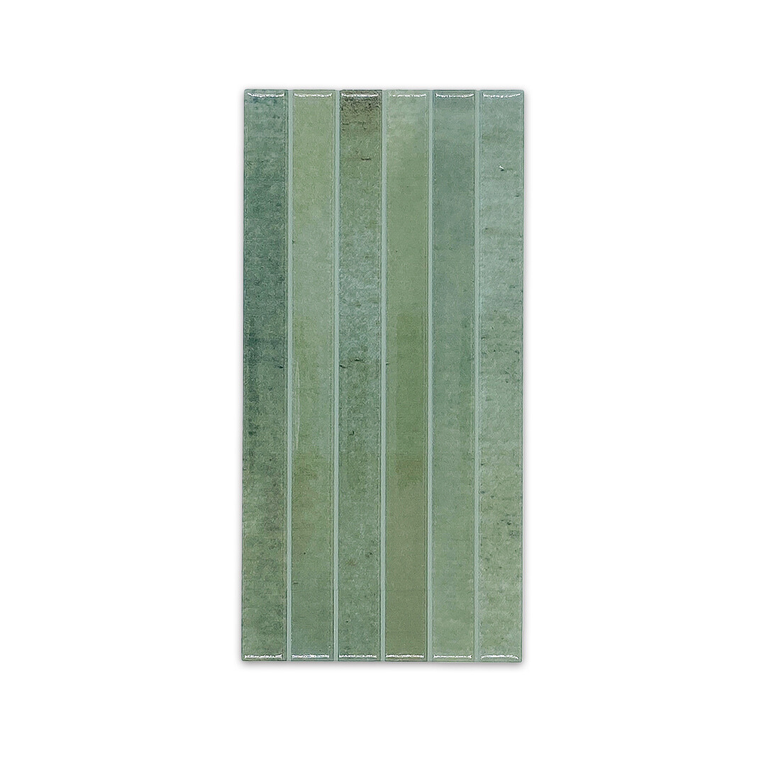 Ariel view of a single 5x10 panel tile in glossy green, the tile has a 3D linear faux grout line fluted kitkat look and colour variation. 